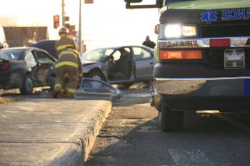 auto accident scene with fire medics